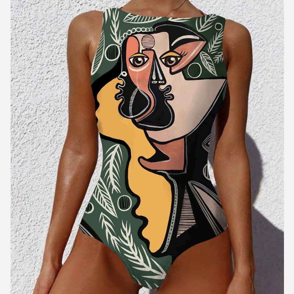 Abstract face and leaves one piece swimsuit